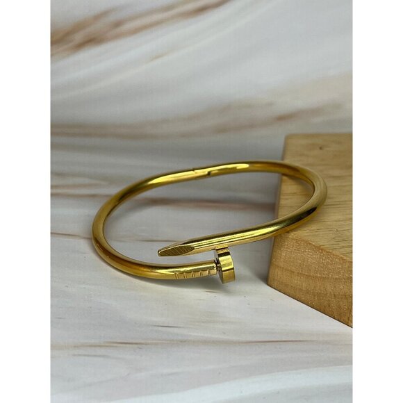 Sia Gold-Tone Nail Design Stainless Steel Bangle - Hypoallergenic & Durable - Picture 1 of 3